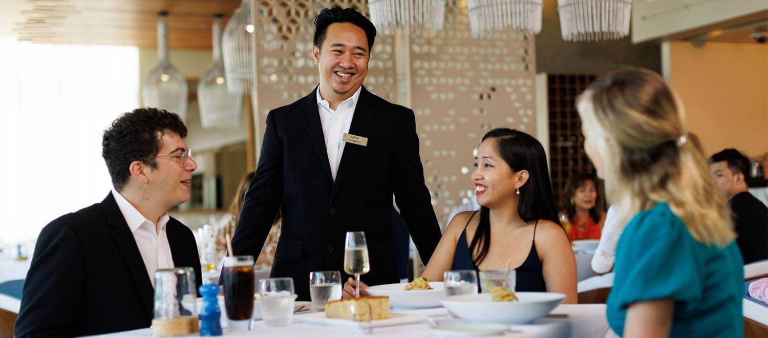 Il Piatto - Waiter visiting customers at dining table